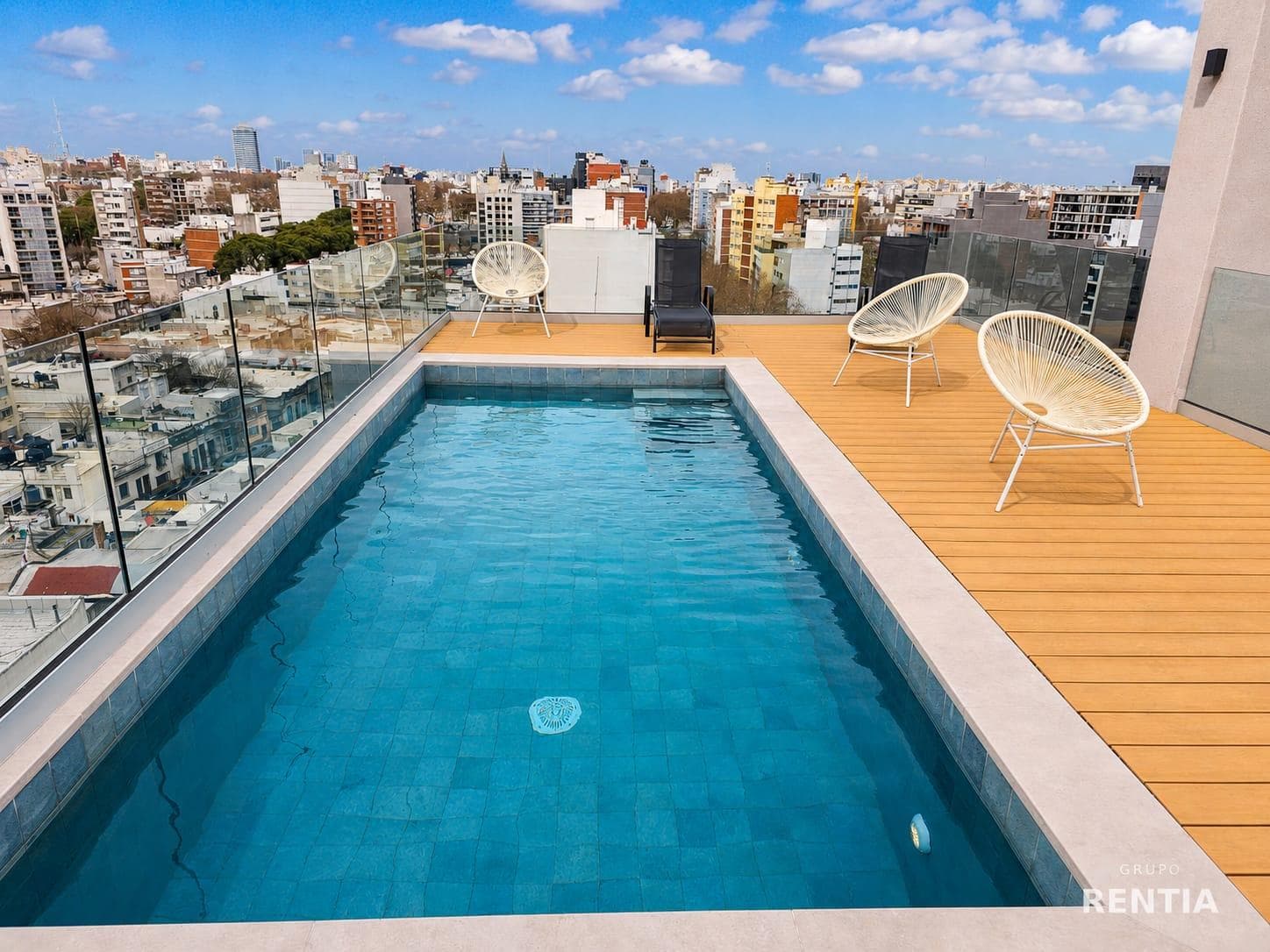 Brand-new studio apartment with a balcony in a gated community featuring a pool, micro-market, gym, and common area with a barbecue