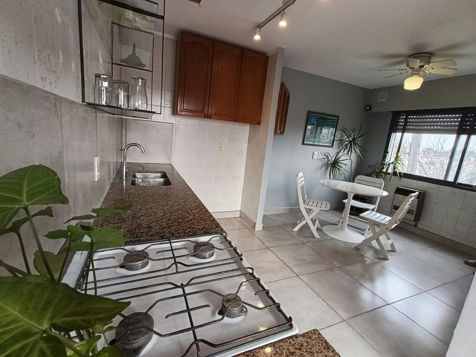 Two-bedroom townhouse for sale, with a terrace and garage; commercial space currently generating rental income
