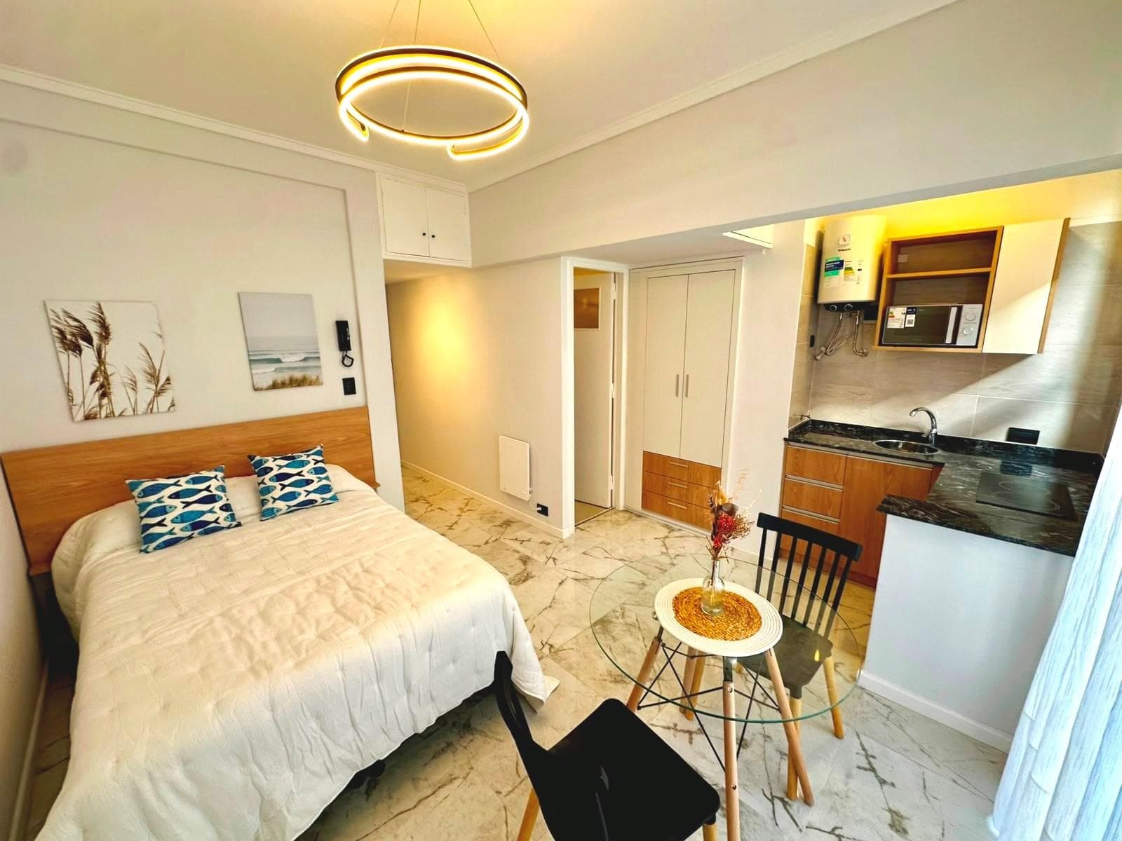 1-Bedroom Apartment with a Balcony and a Side View of the Ocean