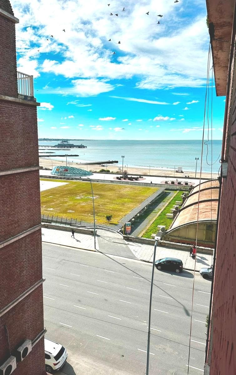 1-Bedroom Apartment with a Balcony and a Side View of the Ocean