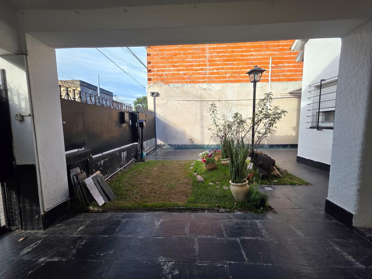 For Sale - 3-Bedroom House with Patio and Garage in Arroyito - Rosario