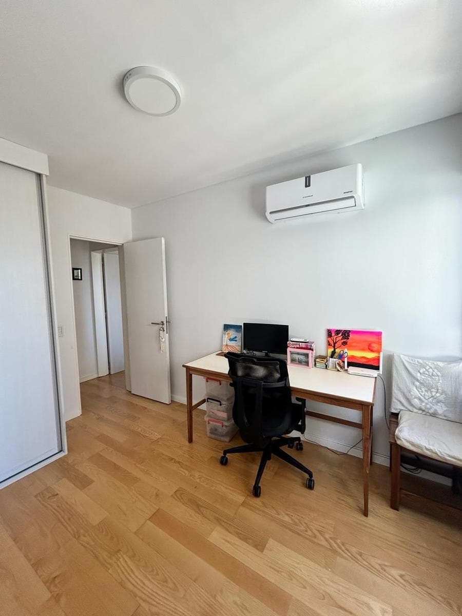 Short-term rental: 2-bedroom apartment near the river, with garage and amenities