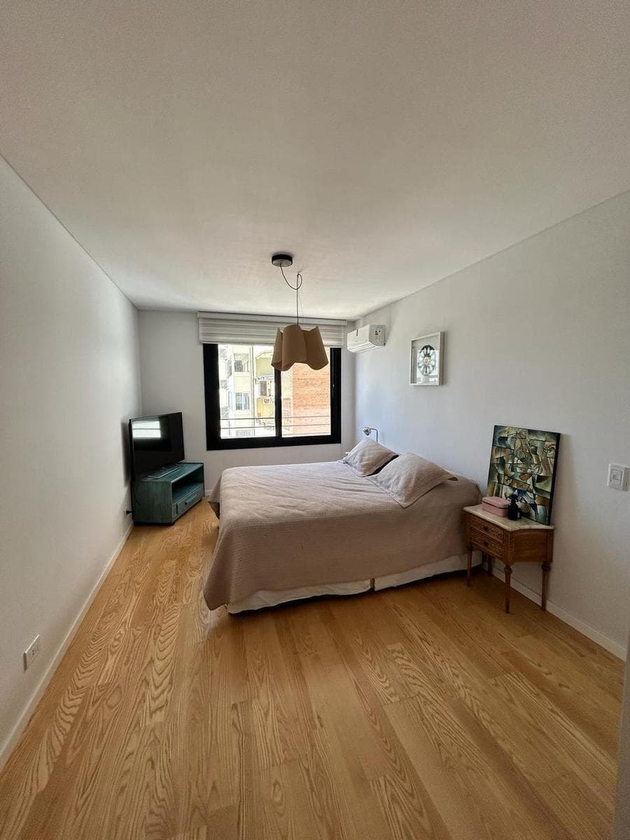 Short-term rental: 2-bedroom apartment near the river, with garage and amenities