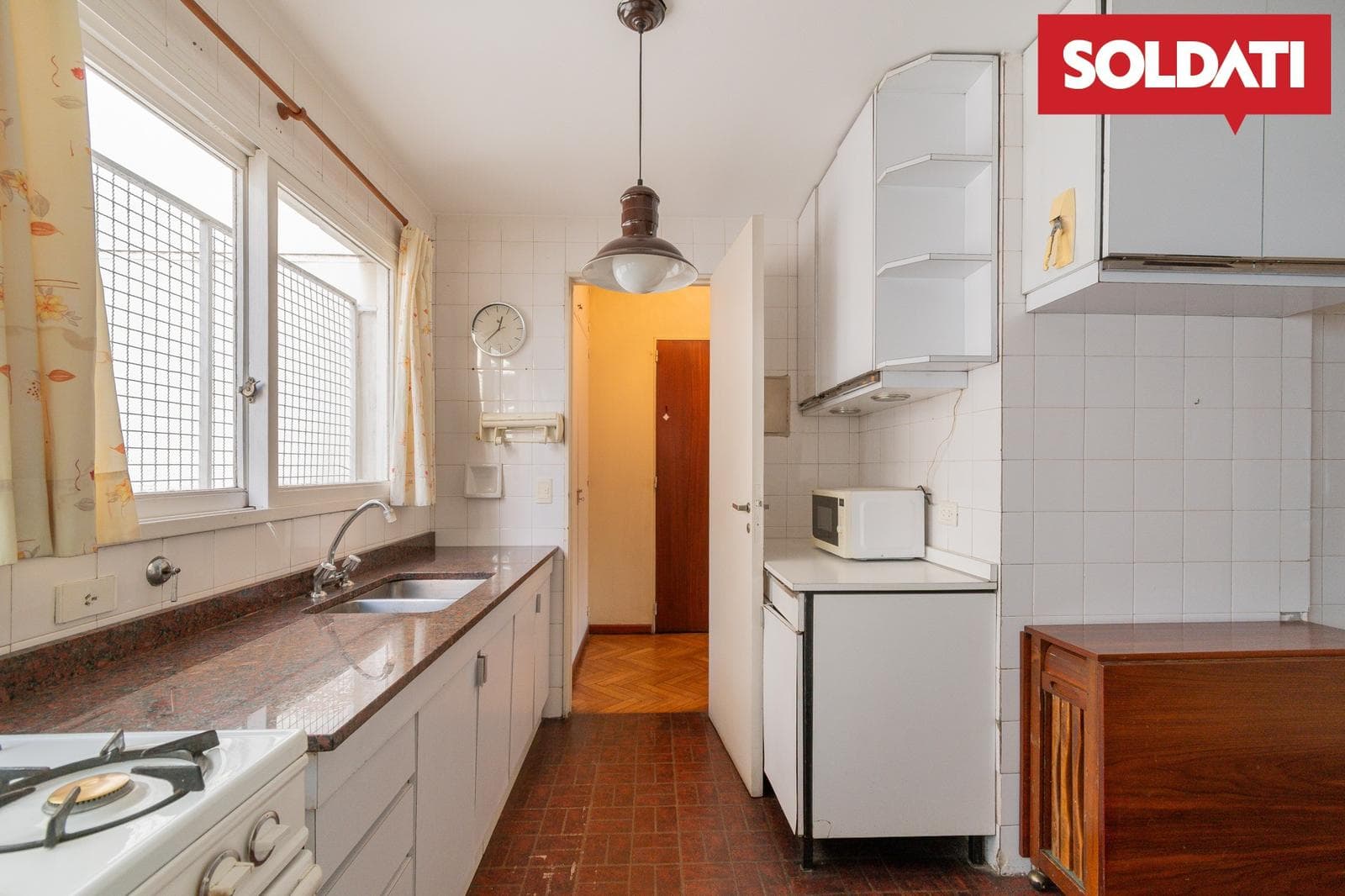 For sale: 4-room apartment with a balcony and a terrace, plus a built-in garage on the ground floor; total area: 84 m