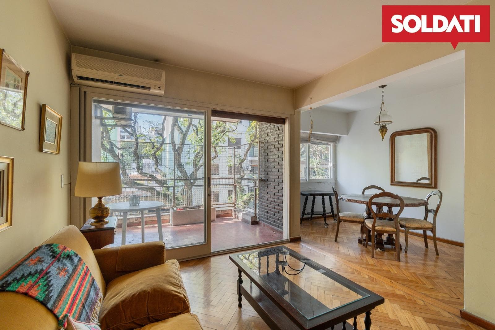 For sale: 4-room apartment with a balcony and a terrace, plus a built-in garage on the ground floor; total area: 84 m