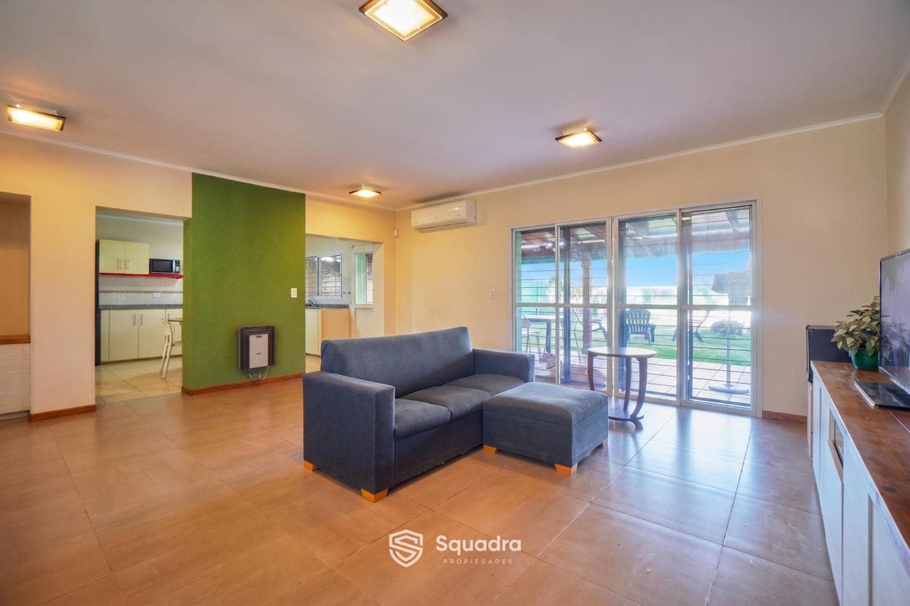 FOR SALE | TRADE - 3-bedroom house with a covered patio, barbecue area, and pool - Los Troncos, Funes.