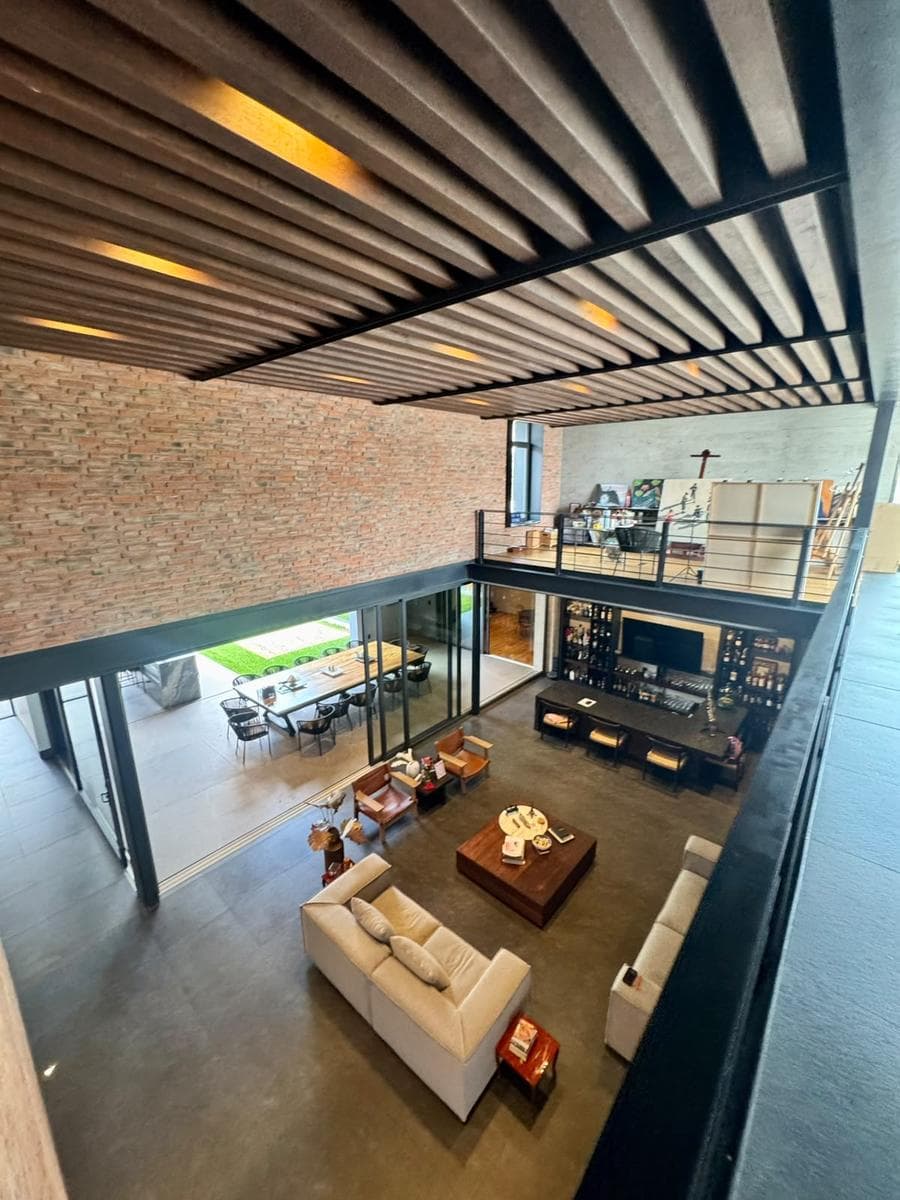 Mansion for Sale in Cumbres with 4 Bedrooms, a Bar, a TV Room, and a Covered Terrace