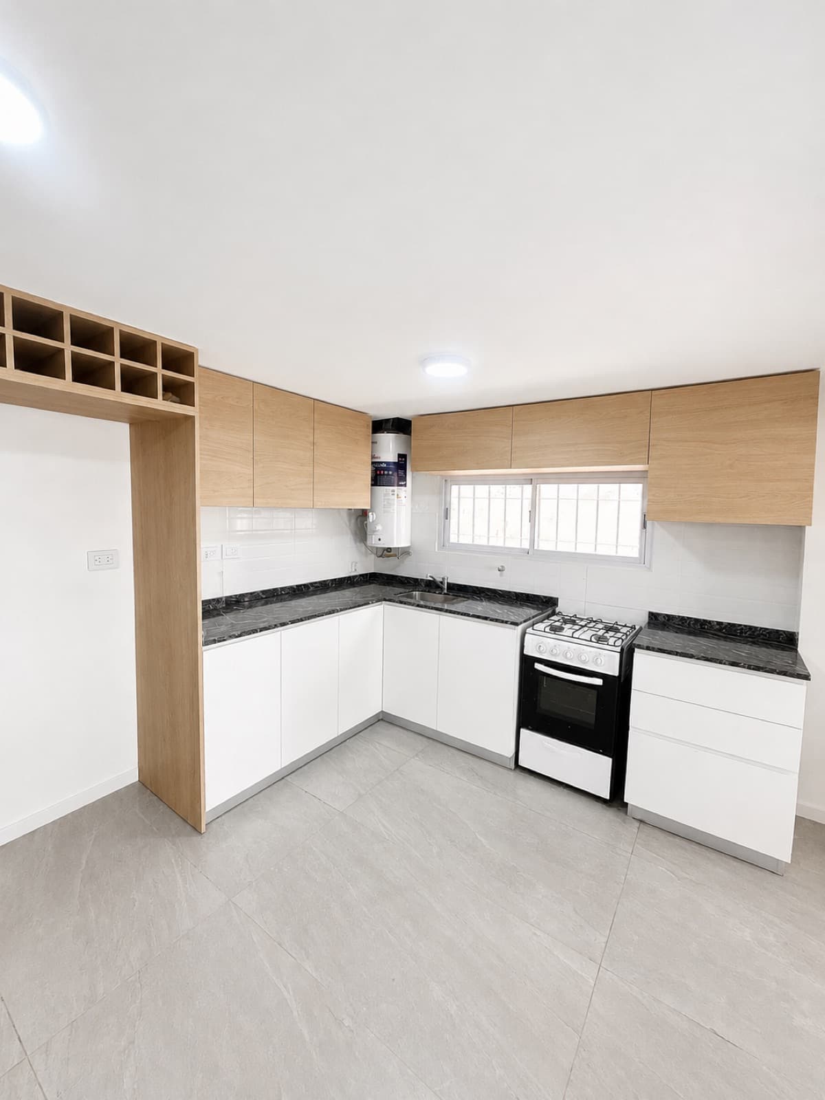 Completely renovated house, three bedrooms, garage, and backyard