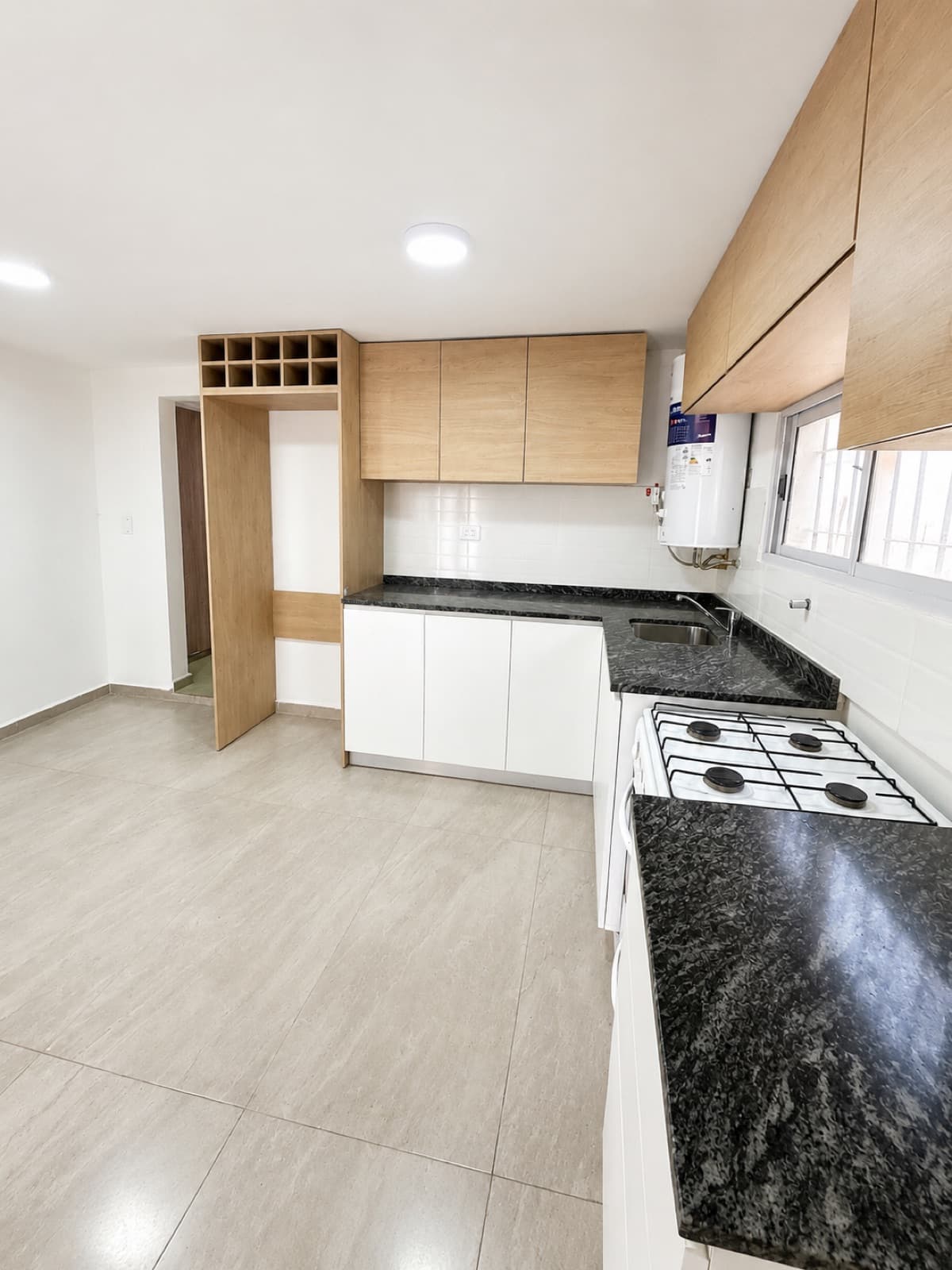 Completely renovated house, three bedrooms, garage, and backyard