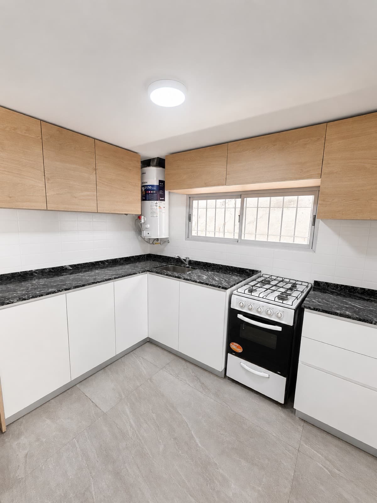 Completely renovated house, three bedrooms, garage, and backyard