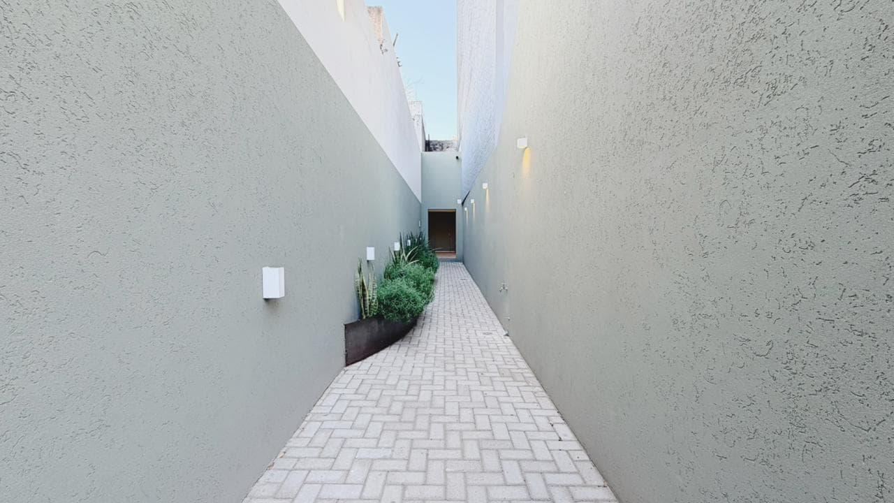 House with a terrace and pool