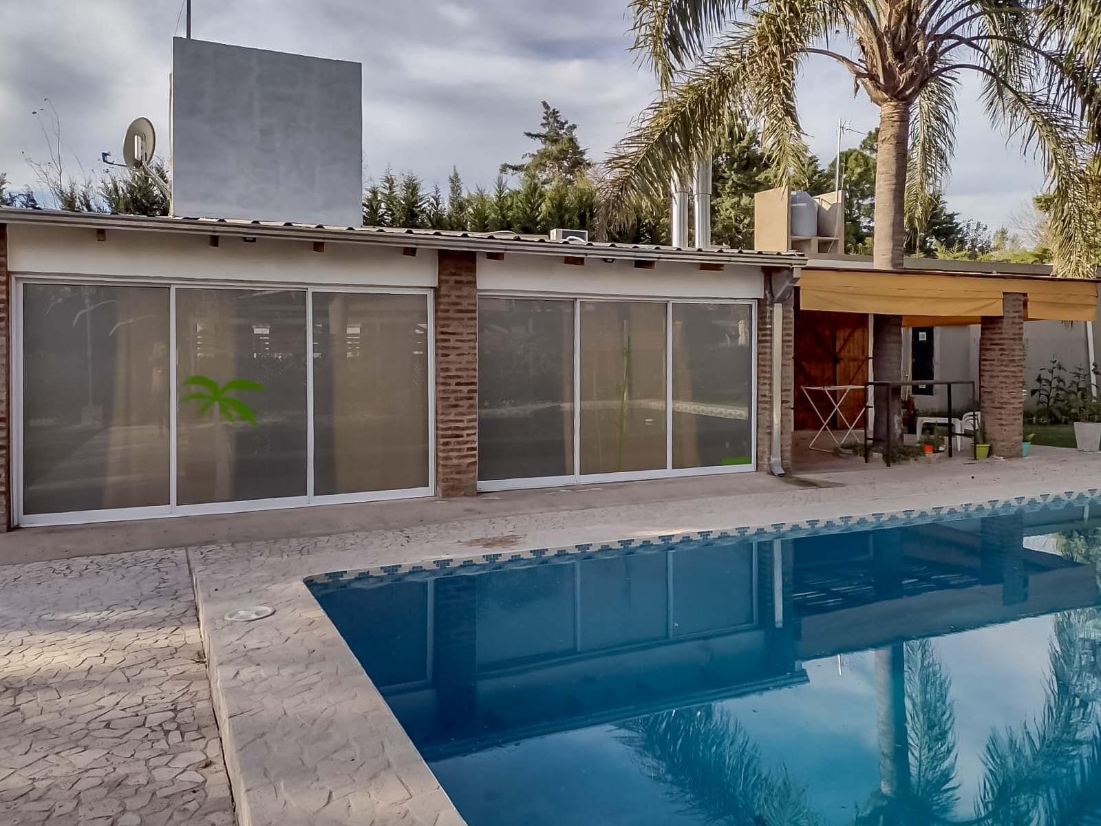 FOR SALE / TRADE - Alpine-style house, barbecue area, and pool - Garita 16, Funes.