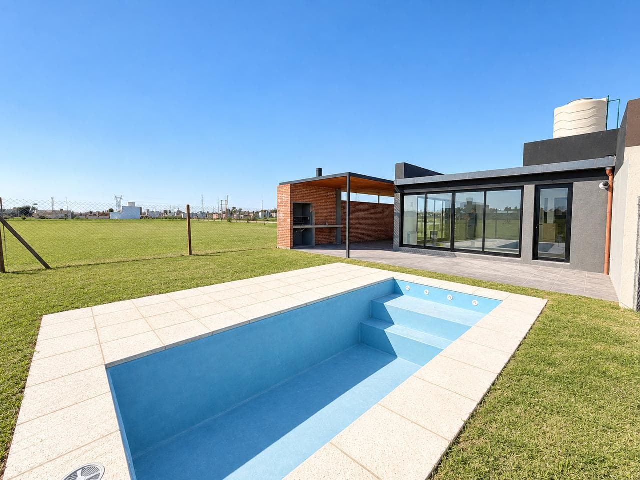 FOR SALE: House on the Main Avenue in Ecotierra, Pueblo Esther.