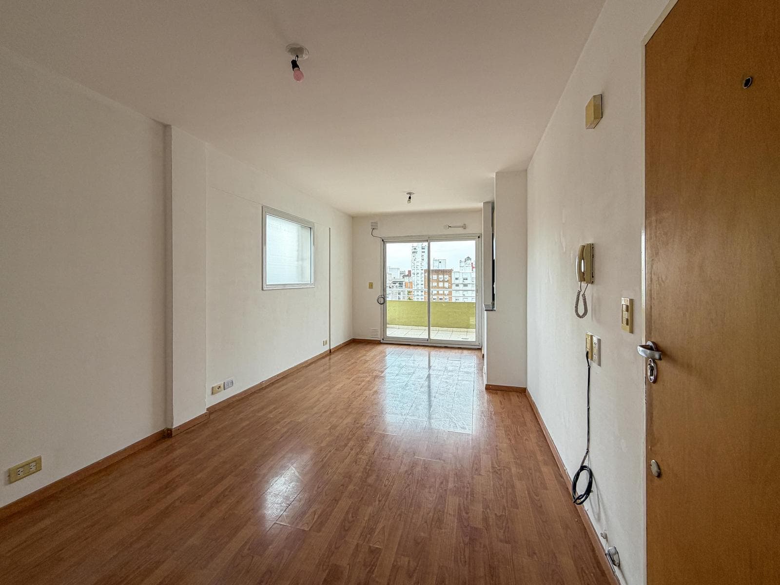 1-bedroom apartment facing the river with a terrace-style balcony