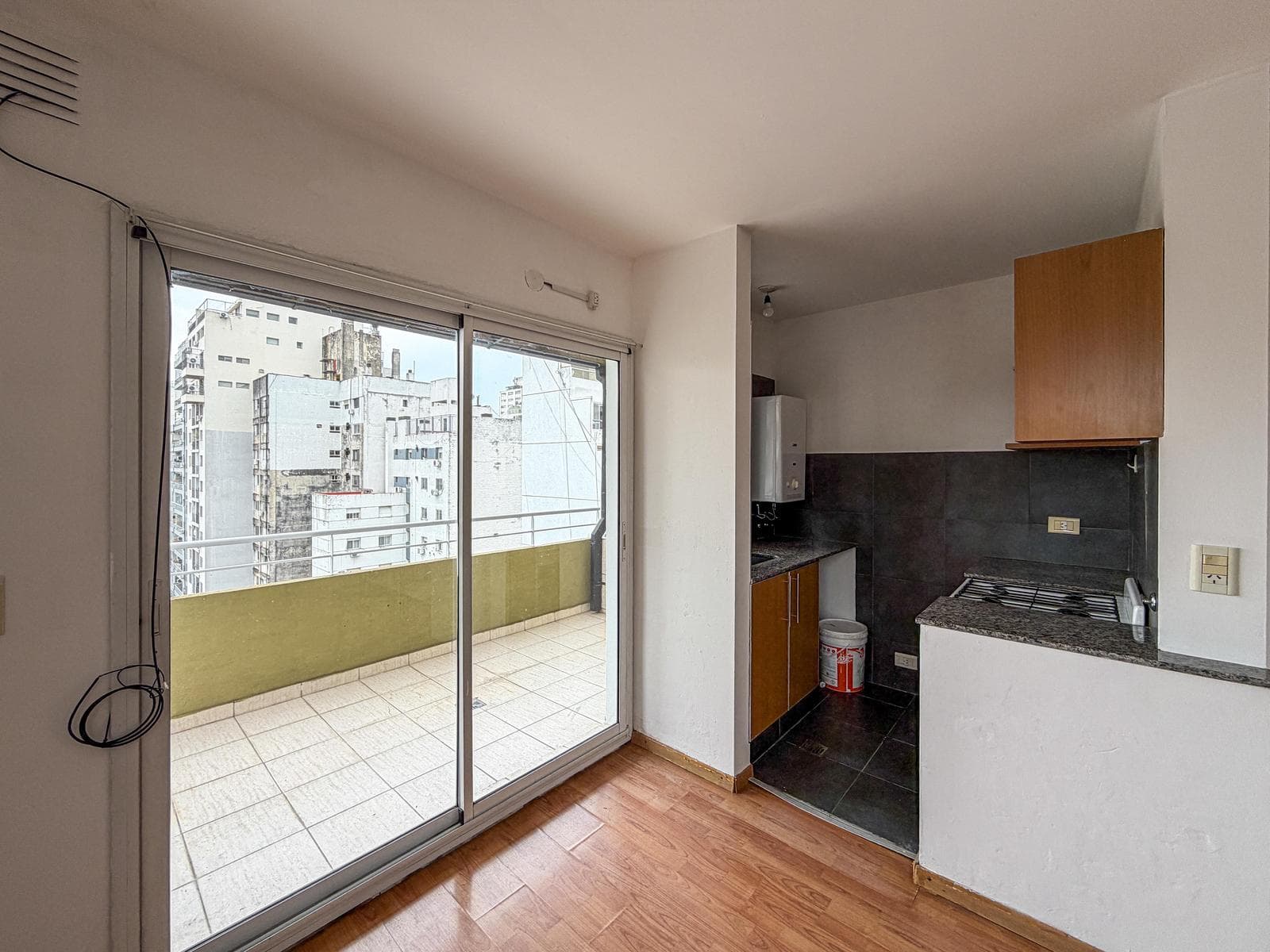 1-bedroom apartment facing the river with a terrace-style balcony