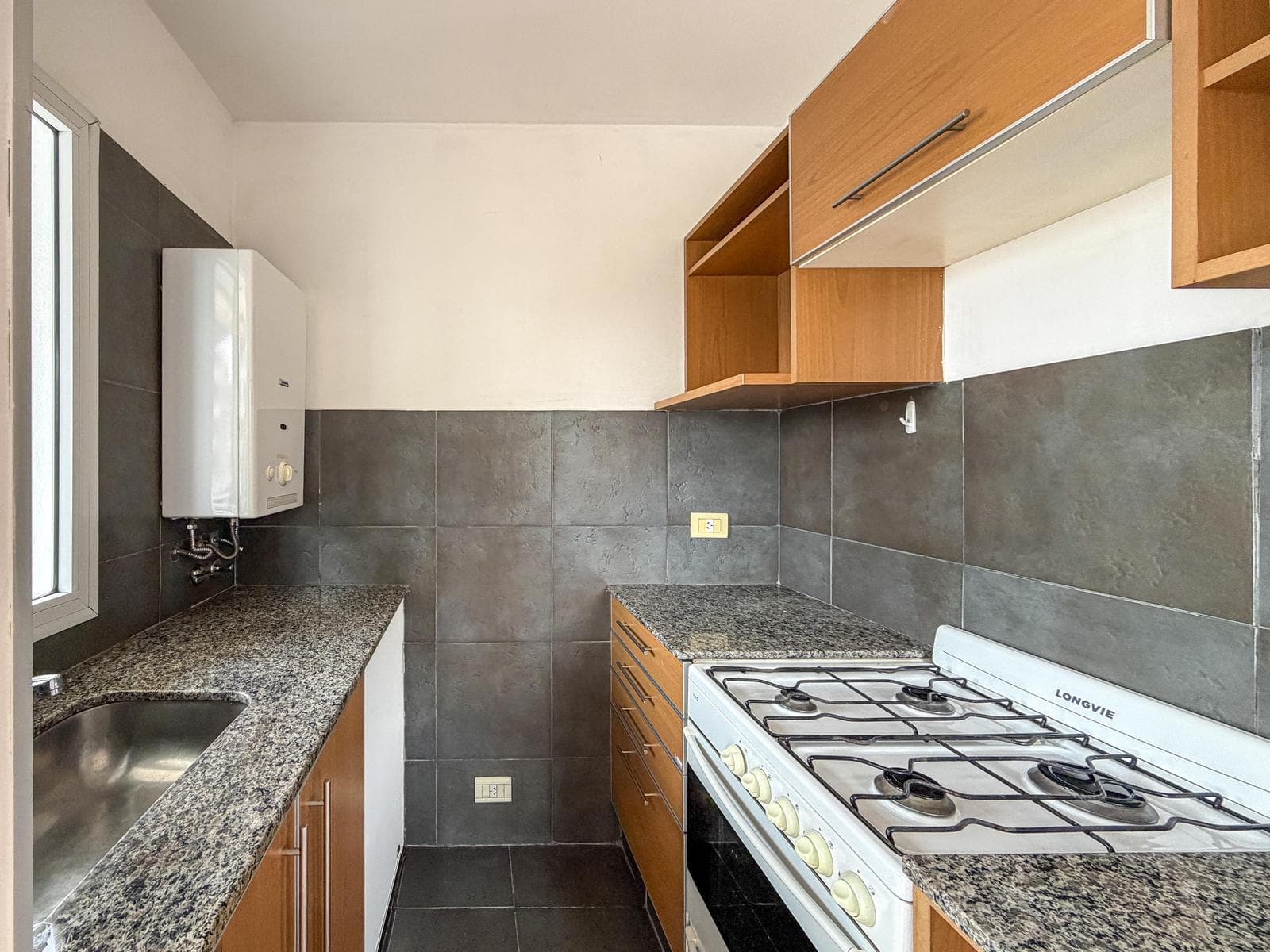 1-bedroom apartment facing the river with a terrace-style balcony
