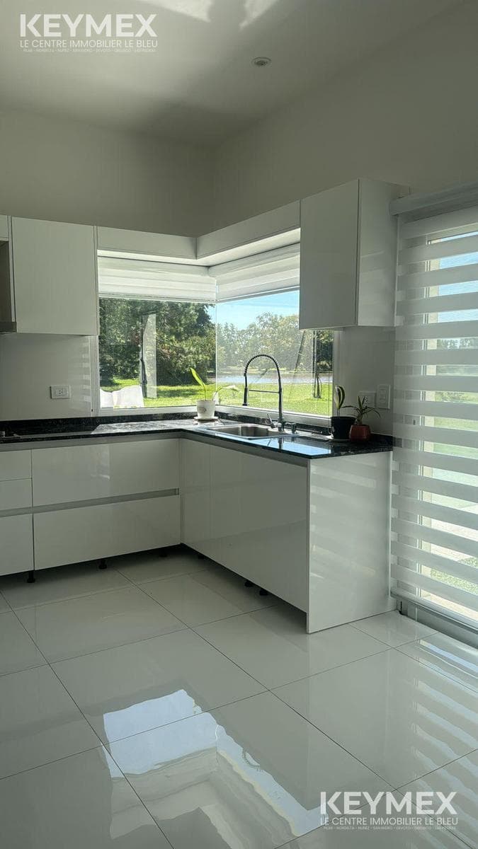 Spectacular home for sale with excellent build quality on a lot overlooking the lagoon