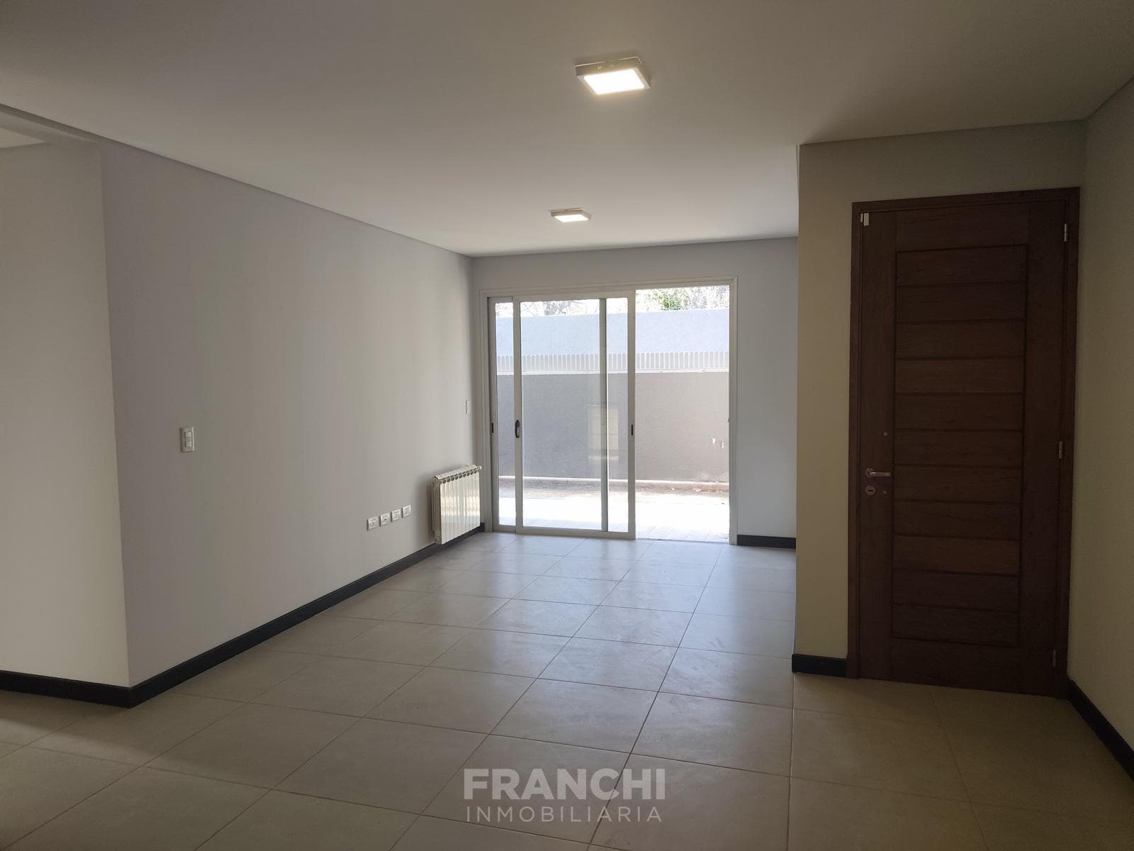 Ground-Floor Apartment with 2 Bedrooms, Patio, and Garage