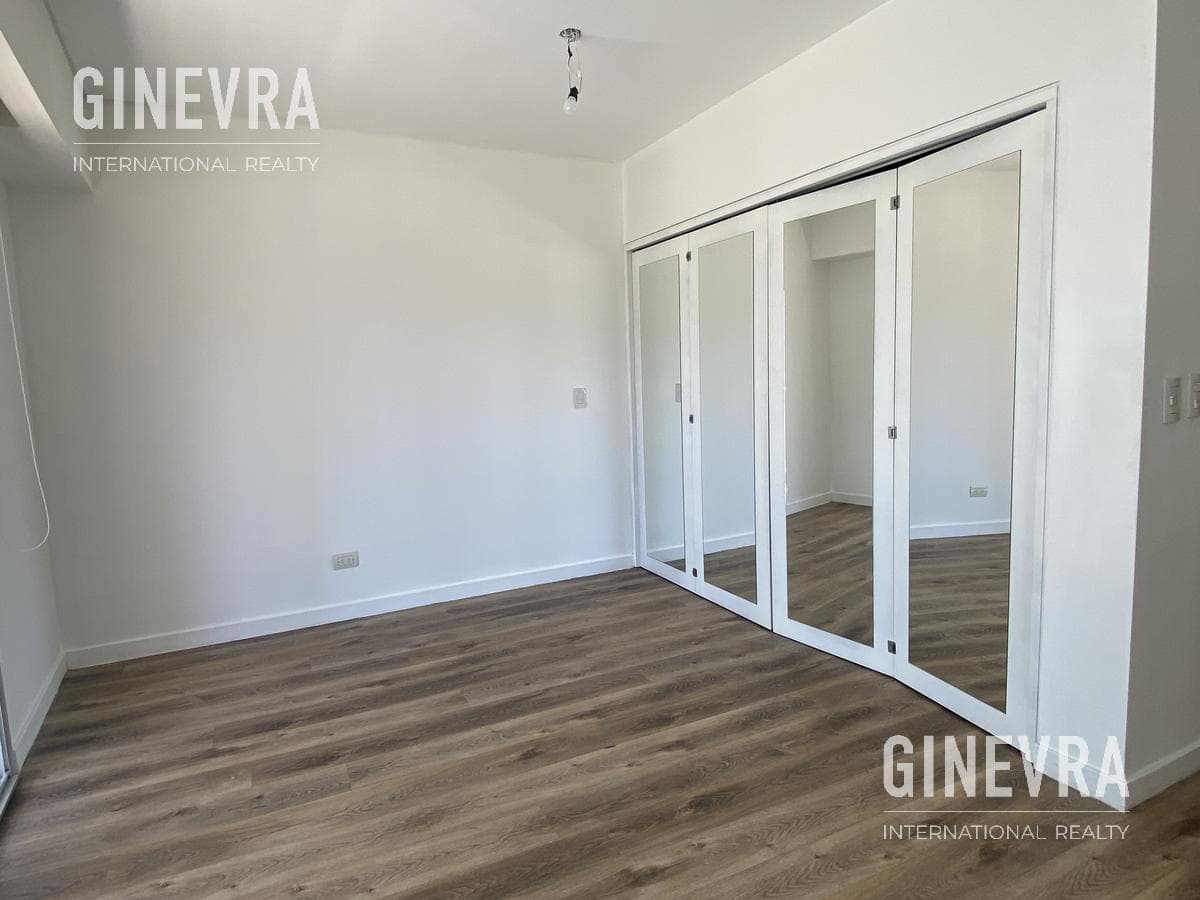 Open-concept studio apartment in Puerto Madero with a balcony and a parking space.