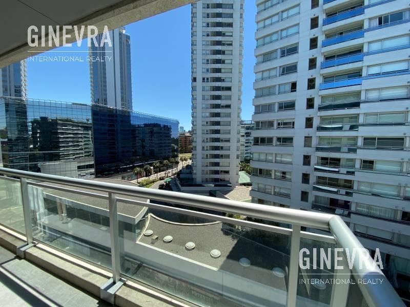 Open-concept studio apartment in Puerto Madero with a balcony and a parking space.