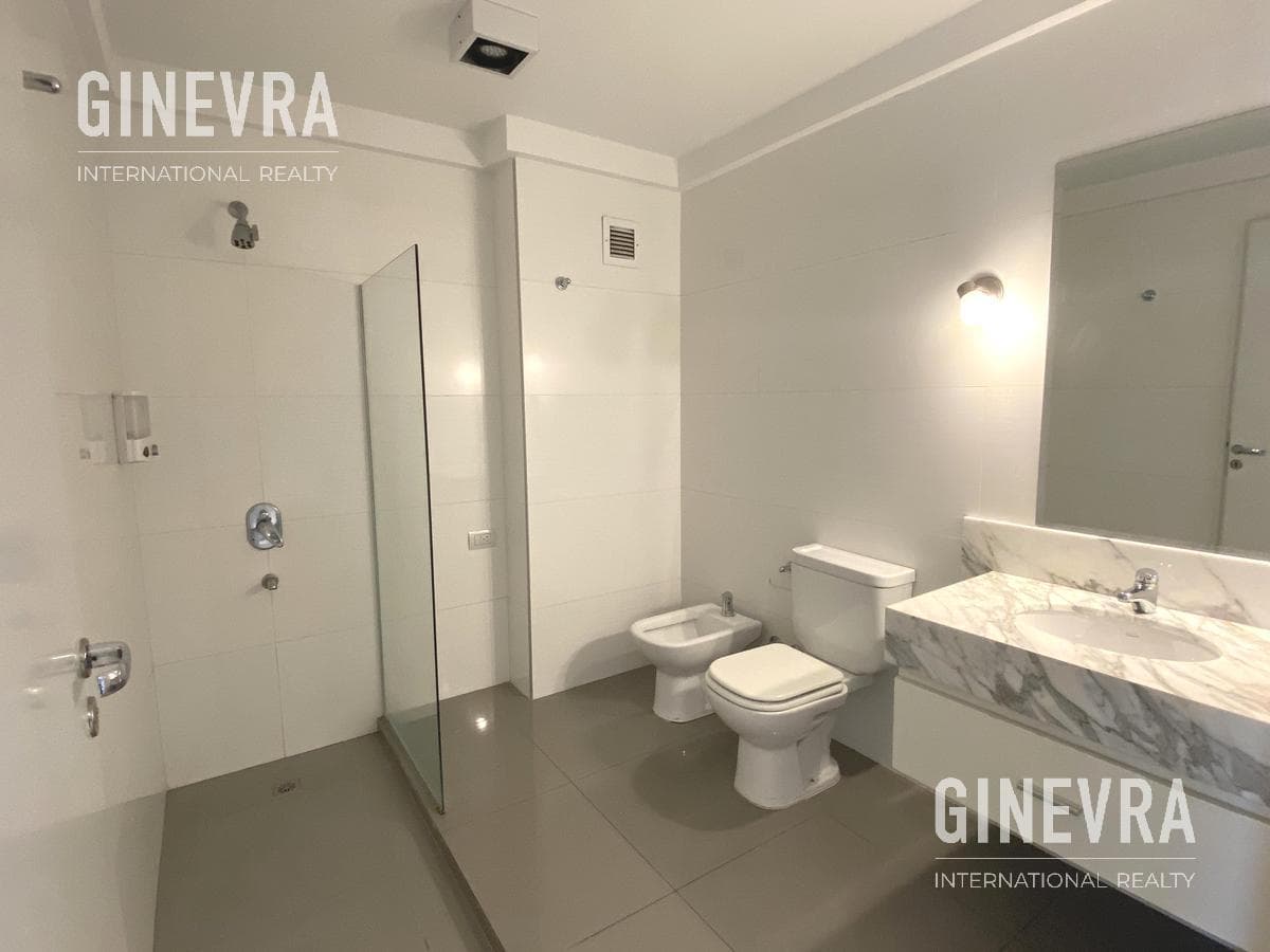 Open-concept studio apartment in Puerto Madero with a balcony and a parking space.
