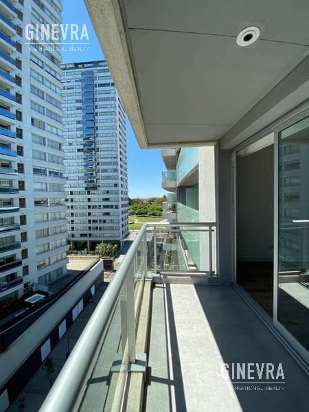 Open-concept studio apartment in Puerto Madero with a balcony and a parking space.