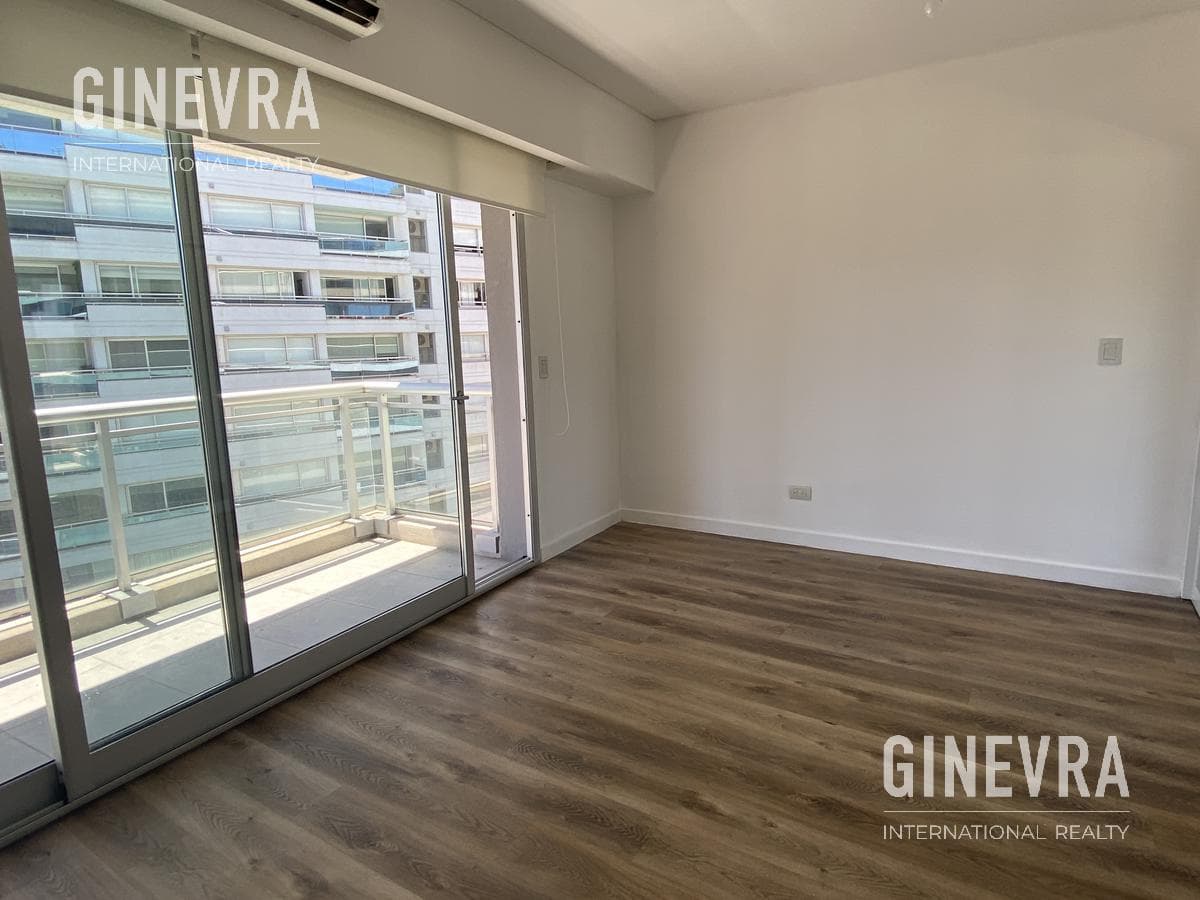 Open-concept studio apartment in Puerto Madero with a balcony and a parking space.