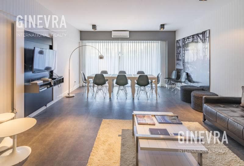 Open-concept studio apartment in Puerto Madero with a balcony and a parking space.