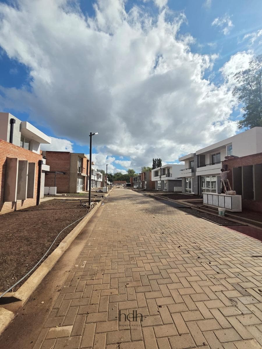House for Sale in Housing Las Veras: 2-Bedroom Duplex with Patio in Valle Escondido