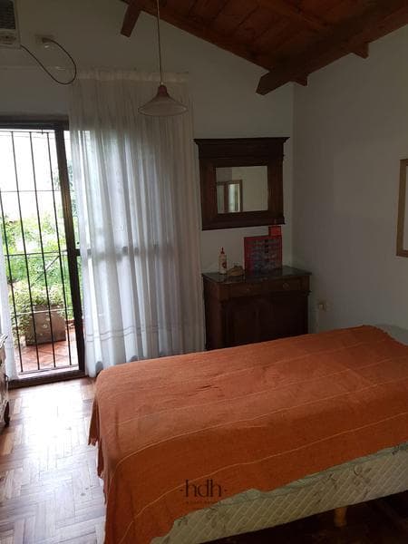 House in Lomas de San Martín: 4 bedrooms, 3 bathrooms, garage, pool, mortgage-eligible