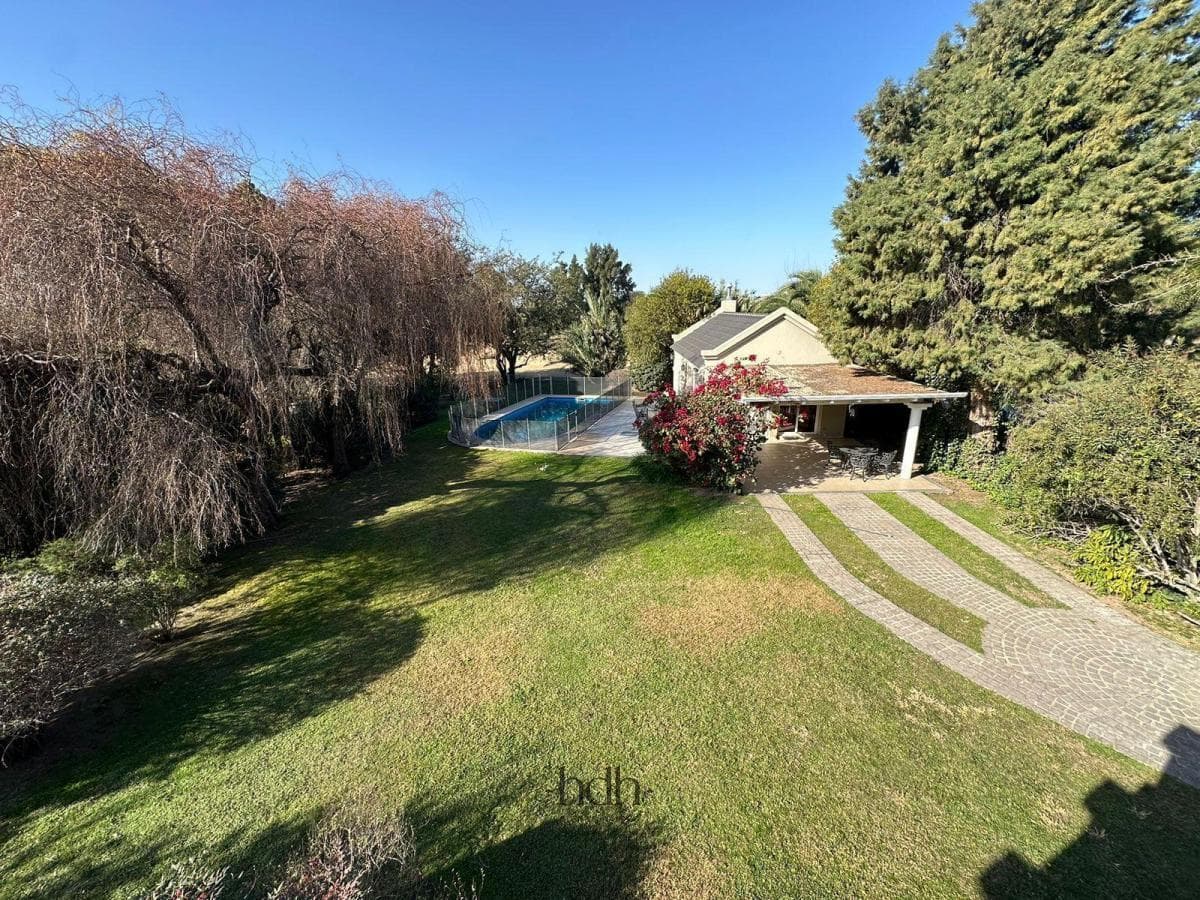House for Sale at Country Jockey Club: 4 Bedrooms, 5 Bathrooms, Golf Course View