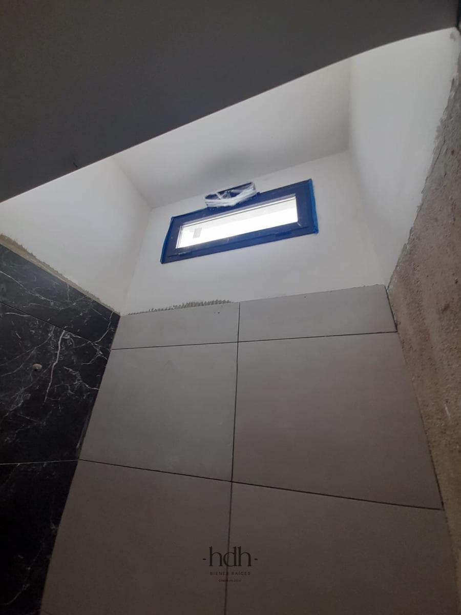 House for Sale: 3-Bedroom, 3-Bathroom Duplex with Barbecue Area and Security System