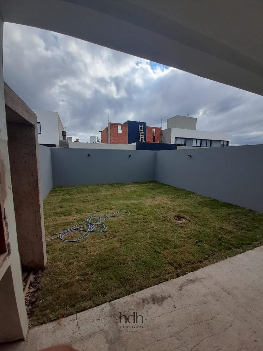House for Sale: 3-Bedroom, 3-Bathroom Duplex with Barbecue Area and Security System