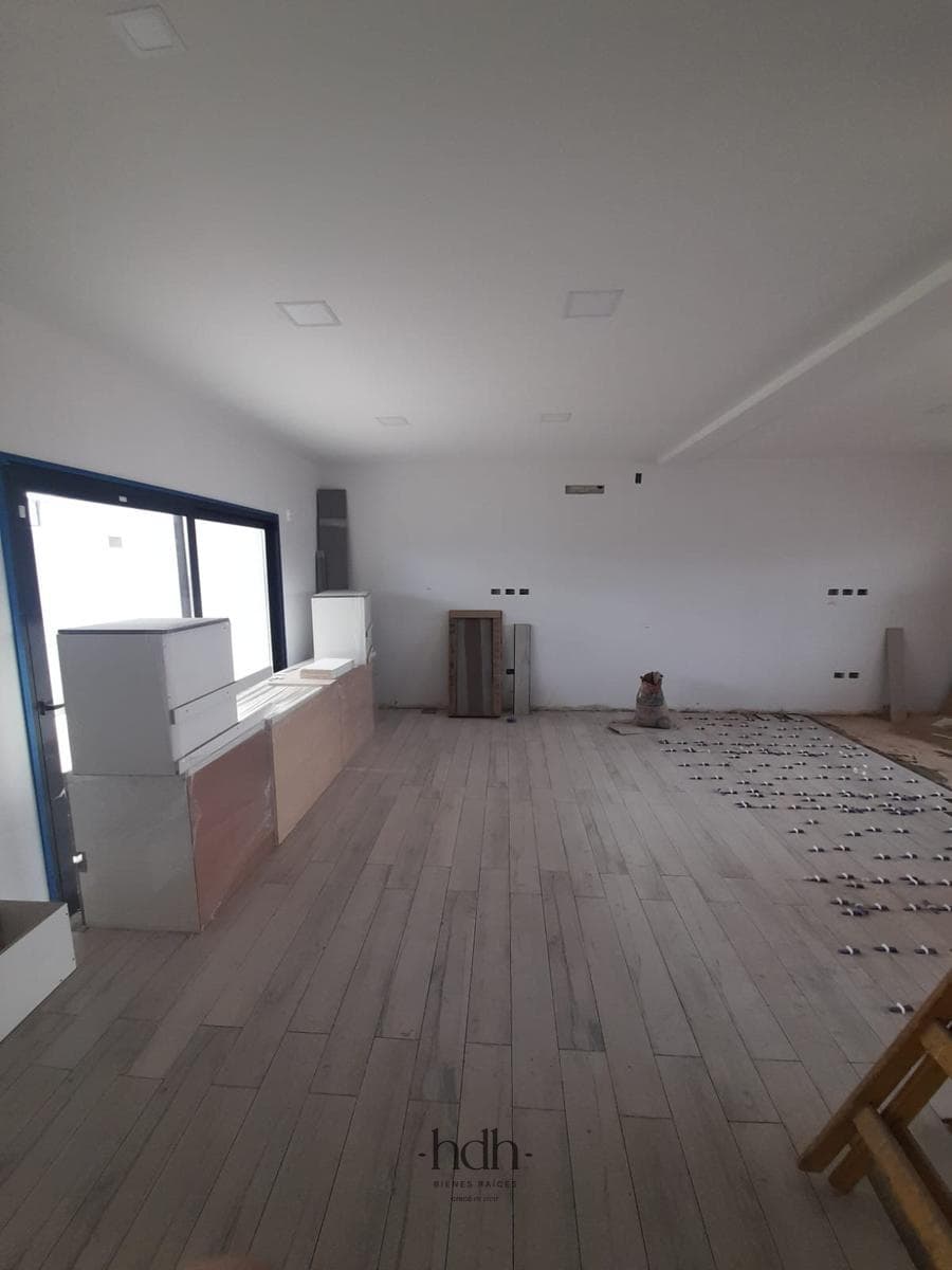House for Sale: 3-Bedroom, 3-Bathroom Duplex with Barbecue Area and Security System