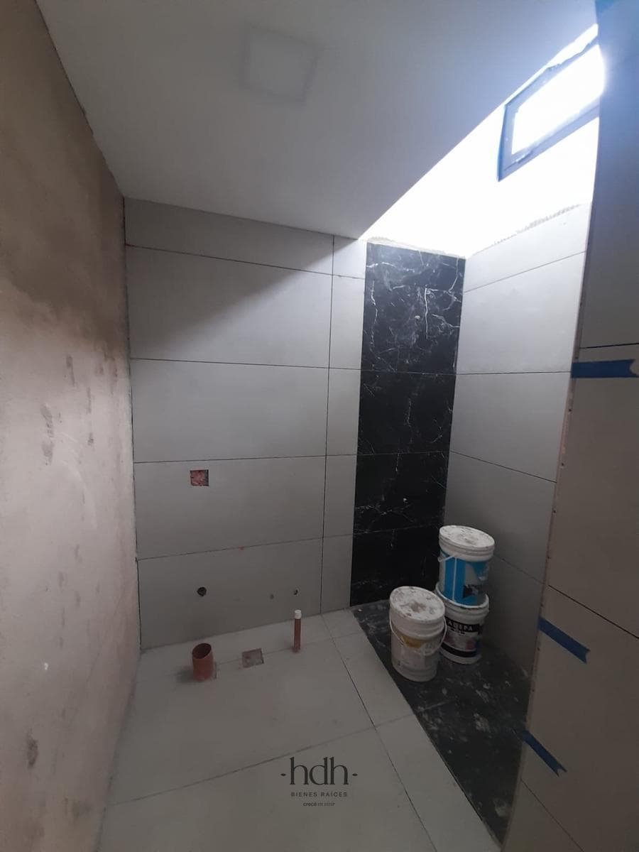 House for Sale: 3-Bedroom, 3-Bathroom Duplex with Barbecue Area and Security System