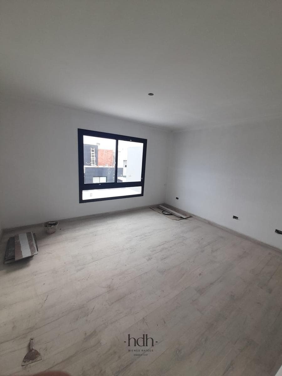 House for Sale: 3-Bedroom, 3-Bathroom Duplex with Barbecue Area and Security System