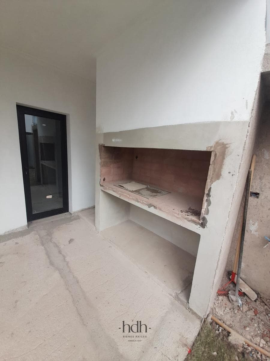 House for Sale: 3-Bedroom, 3-Bathroom Duplex with Barbecue Area and Security System
