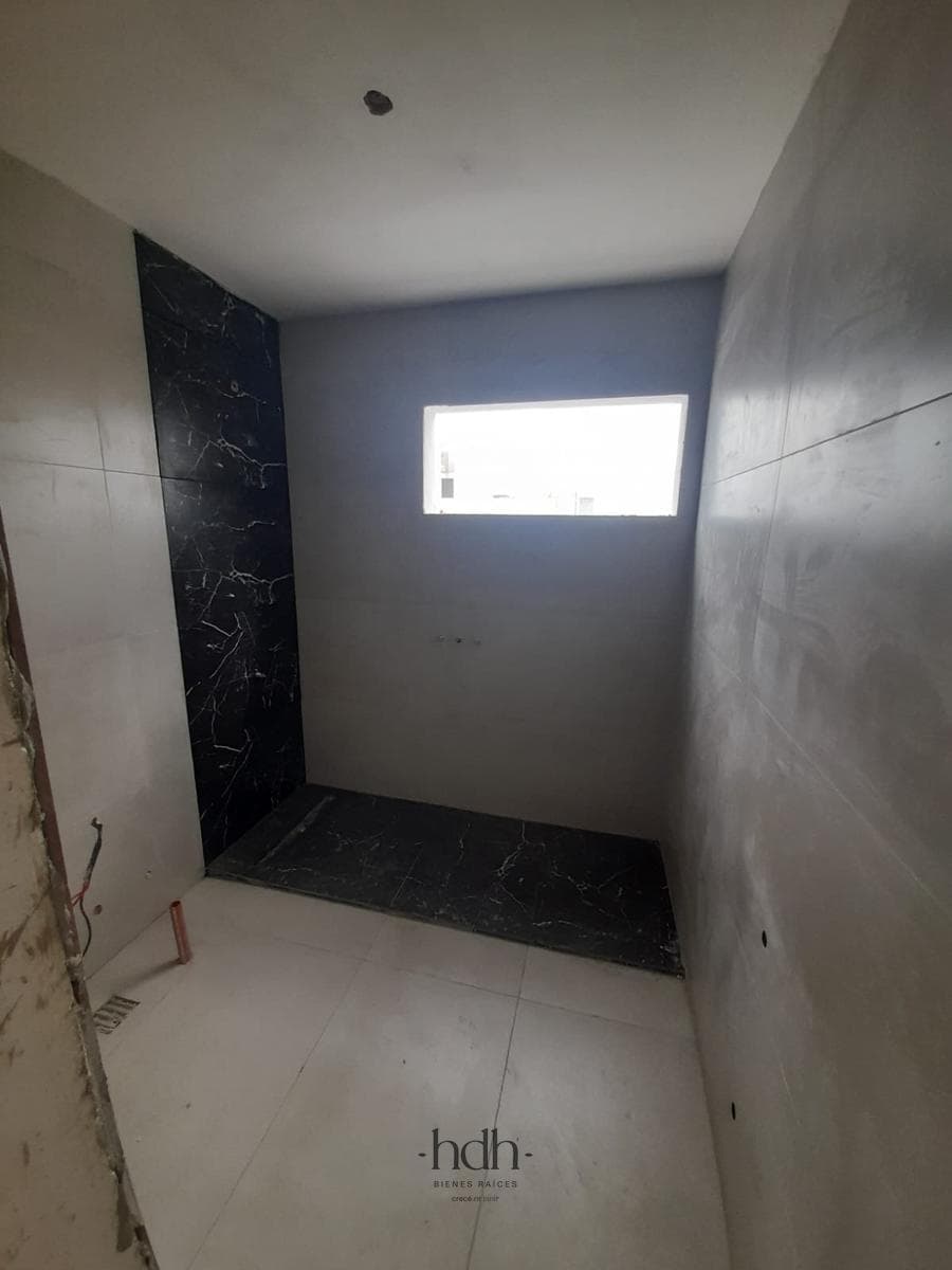 House for Sale: 3-Bedroom, 3-Bathroom Duplex with Barbecue Area and Security System