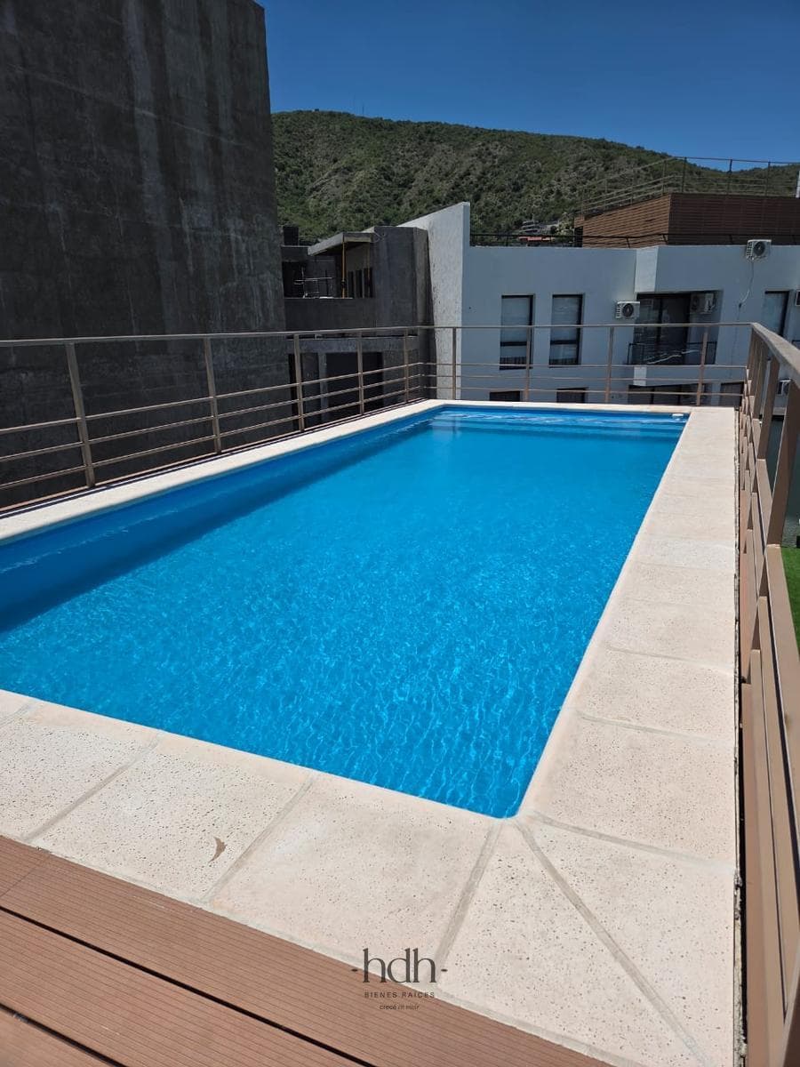 Brand-New 1-Bedroom Apartment in Villa Carlos Paz with Garage