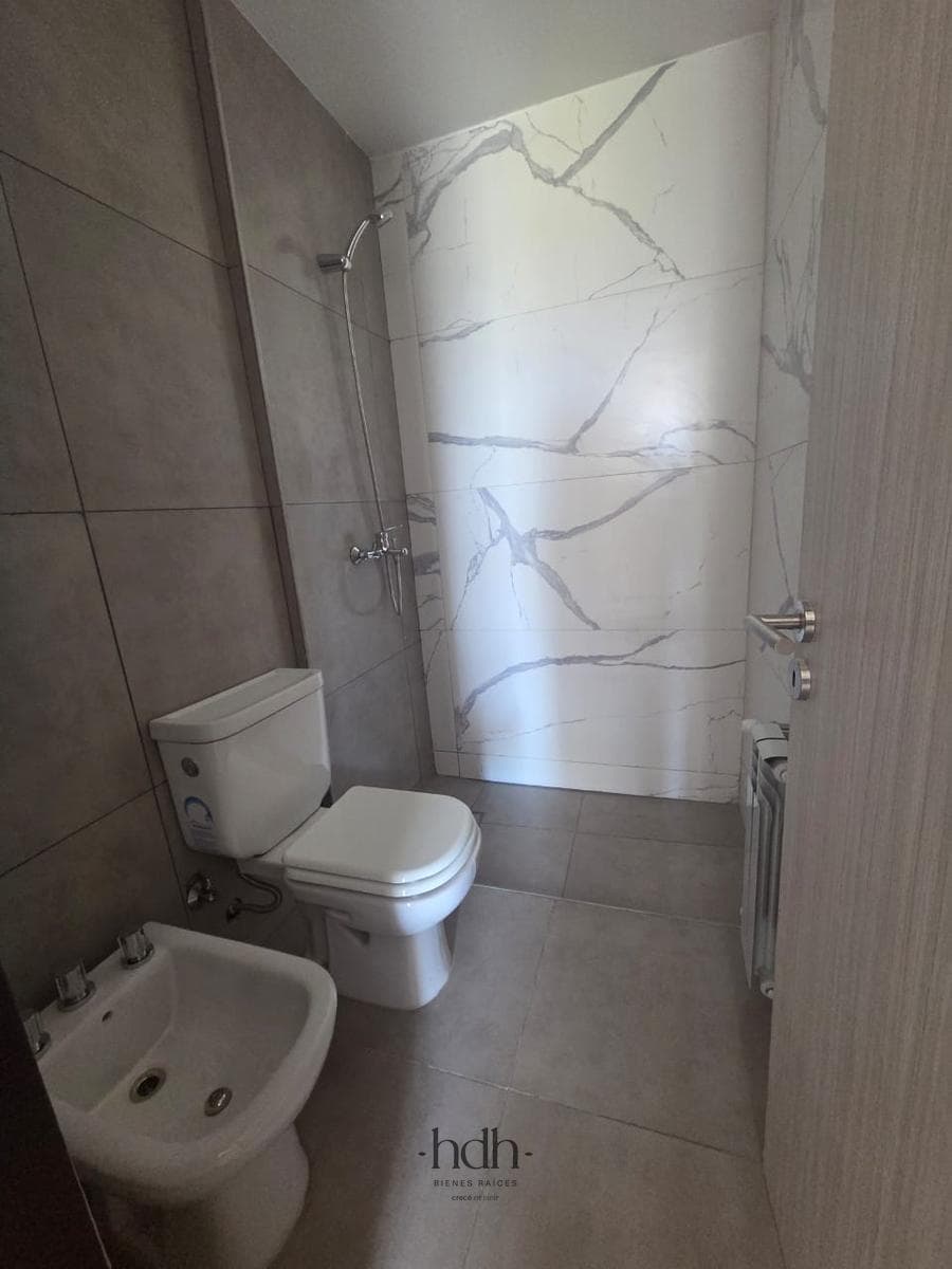 Brand-New 1-Bedroom Apartment in Villa Carlos Paz with Garage