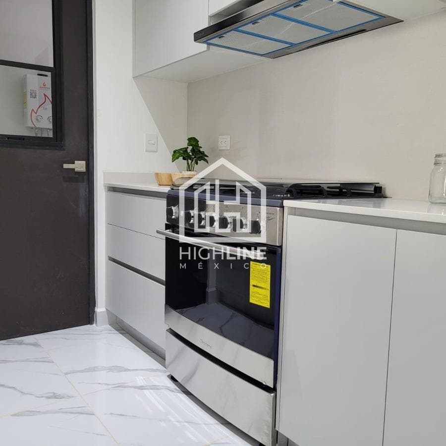 Departamento en venta en Cancún de 2 habitaciones con alberca,huerto y más