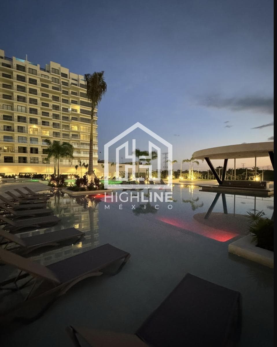 2-Bedroom Condo for Sale in Cancún with a Bowling Alley and Family Areas