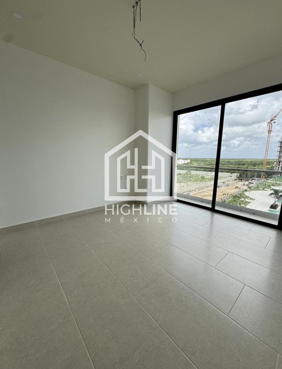 2-Bedroom Condo for Sale in Cancún with a Bowling Alley and Family Areas