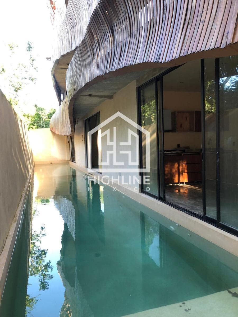 EN VENTA ESTUDIO EN TULUM CON ÁREA DE BBQ, JACUZZI, ROOFTOP BAR, ROOFTOP POOL, SWIMUP POOL