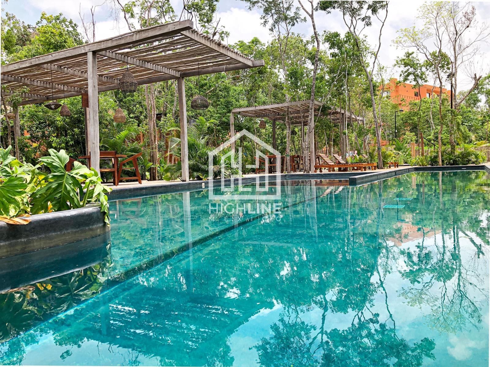 2-bedroom apartment for sale in Tulum, featuring very spacious rooms, a pool, and a gym