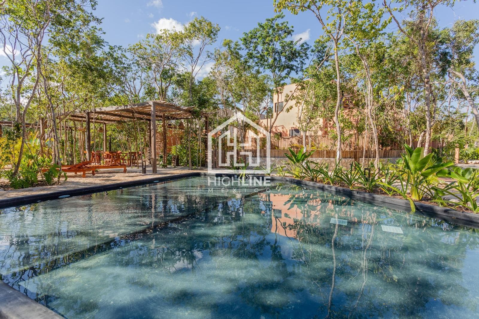 HOUSE FOR SALE IN TULUM: 3 BEDROOMS WITH INFINITY POOL, GATHERING AREA, AND PLAY AREA FOR CHILDREN
