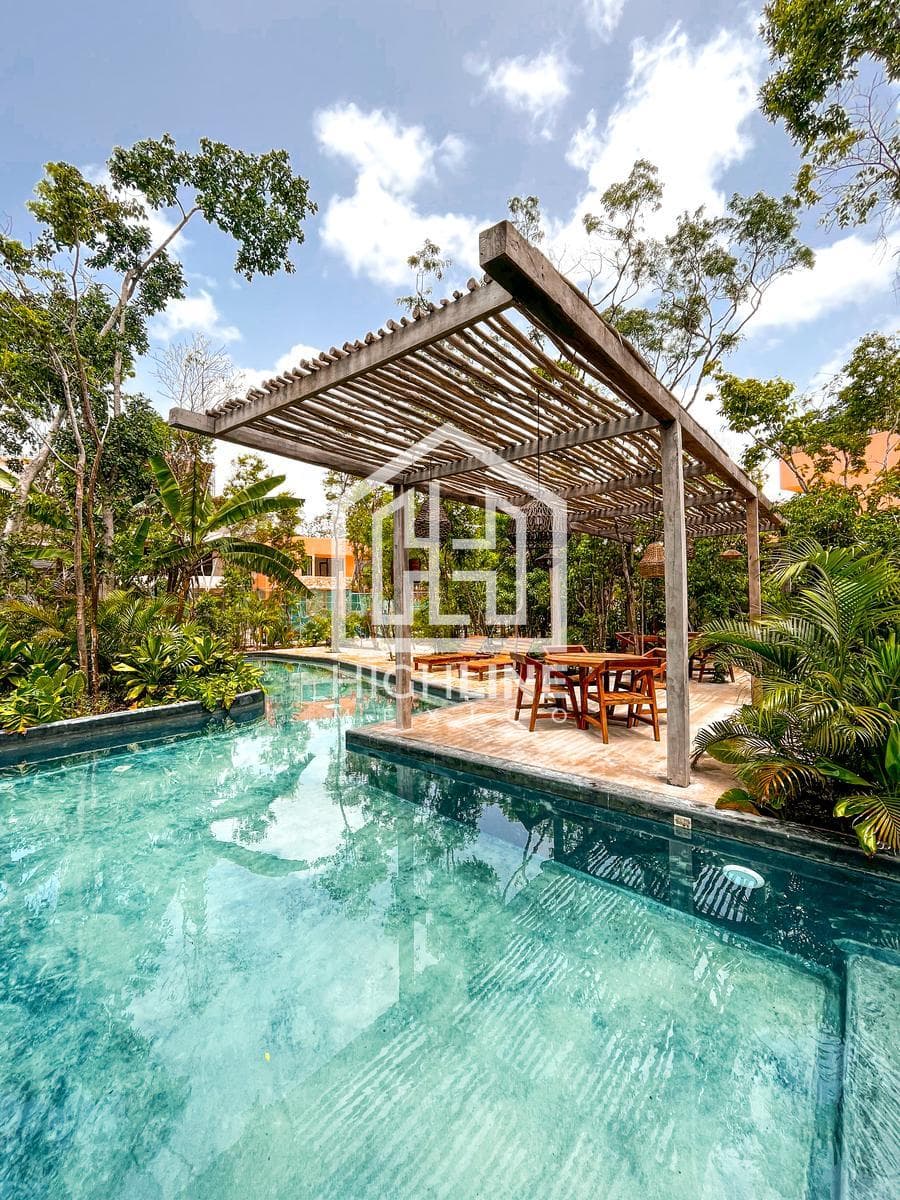 HOUSE FOR SALE IN TULUM: 3 BEDROOMS WITH INFINITY POOL, GATHERING AREA, AND PLAY AREA FOR CHILDREN