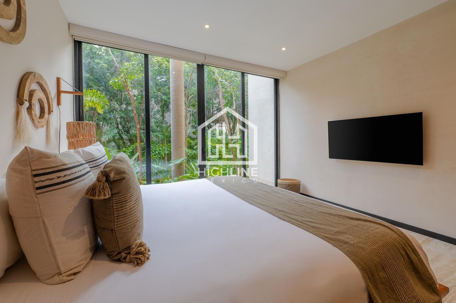 2-bedroom apartment for sale in Tulum with a large pool, gym, and pet-friendly policy