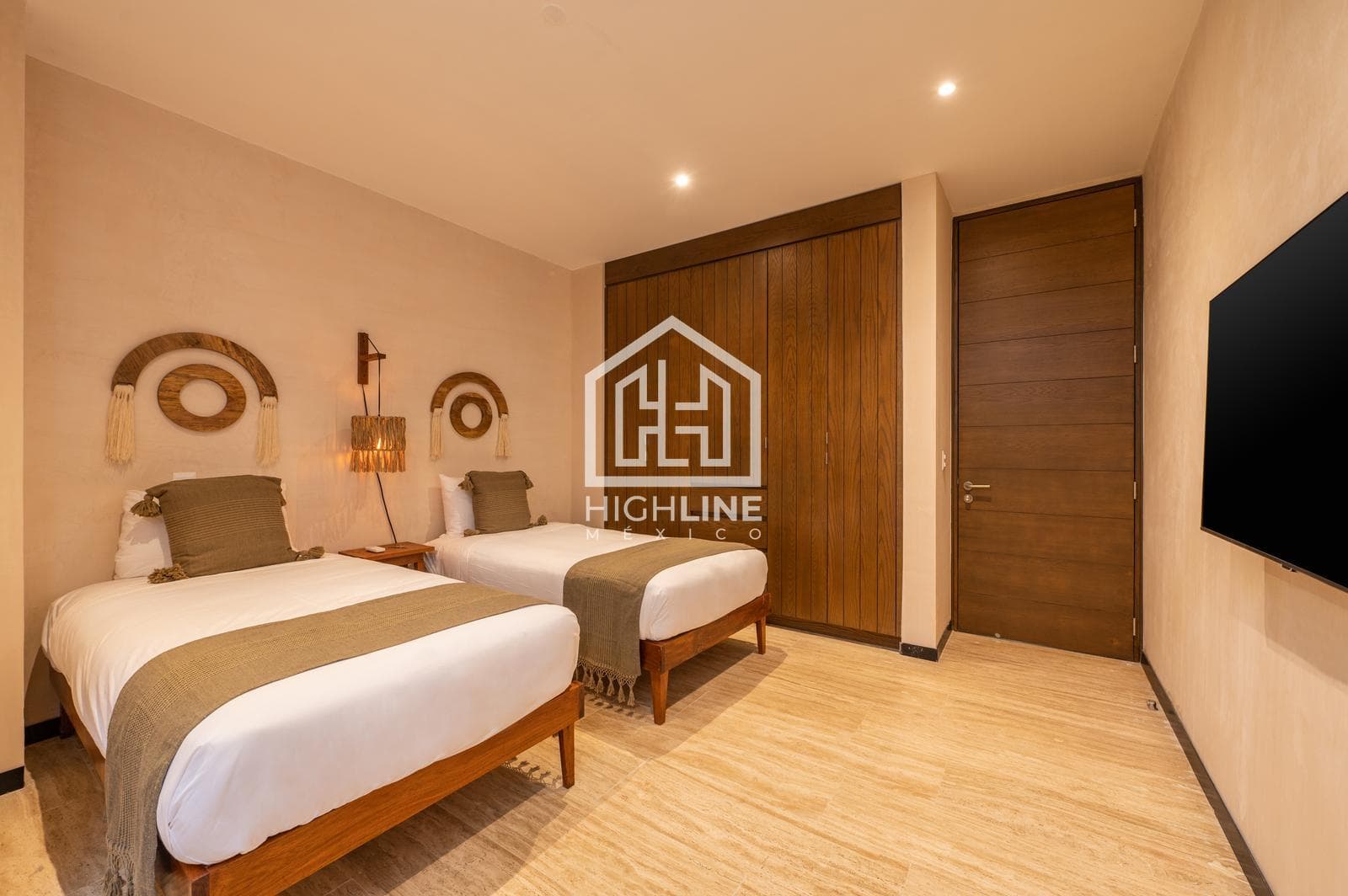 2-bedroom apartment for sale in Tulum with a large pool, gym, and pet-friendly policy