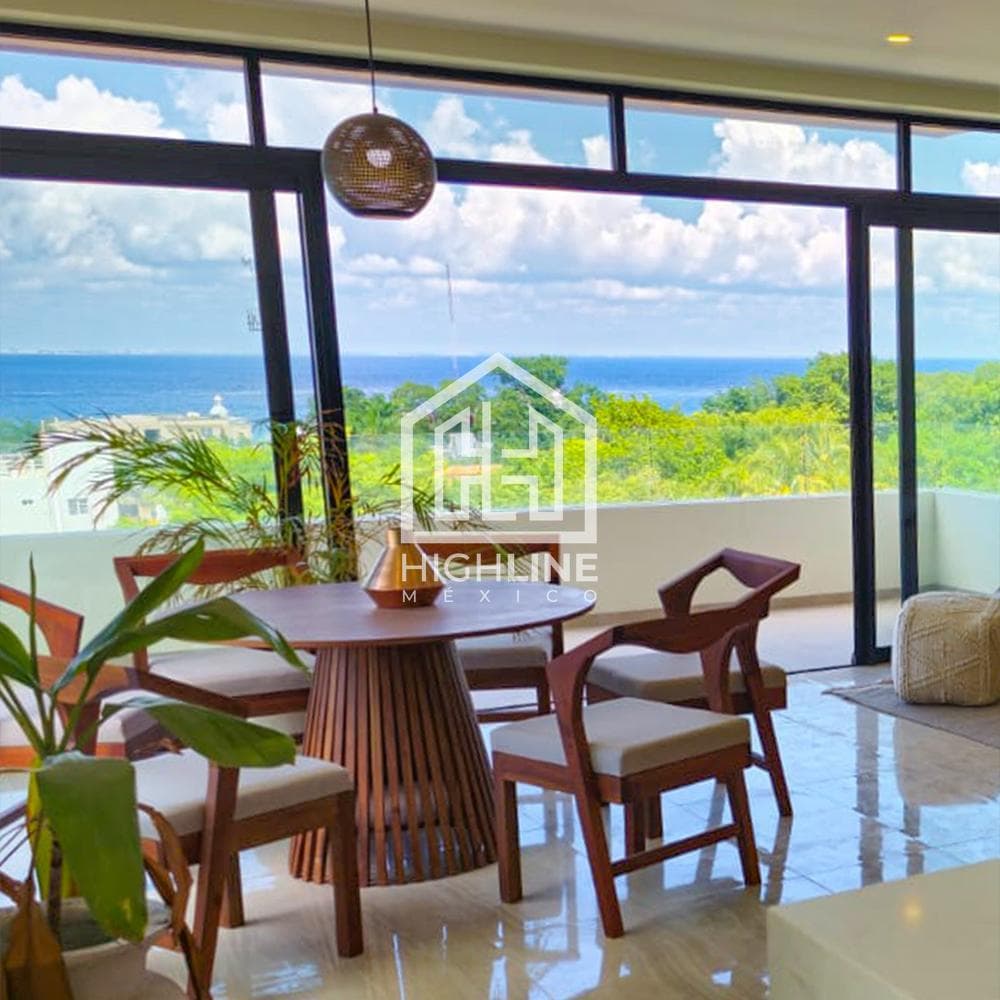 2-bedroom apartment with ocean views and a rooftop deck. Cozumel